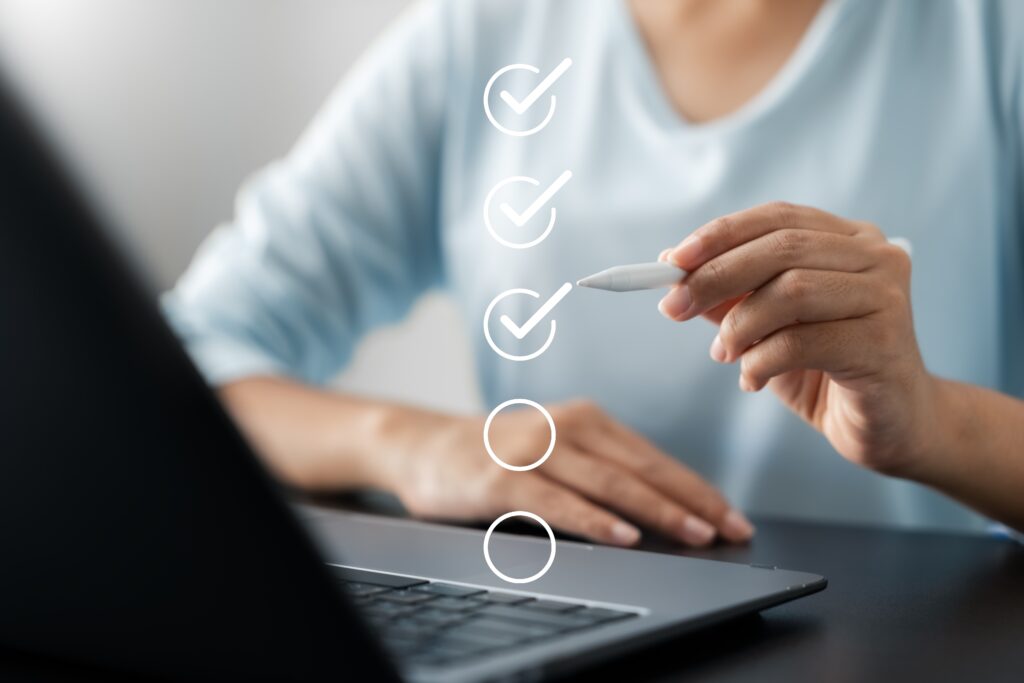 women marking off a list with check marks